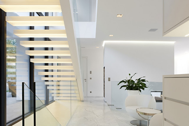Hallway with modern staircase