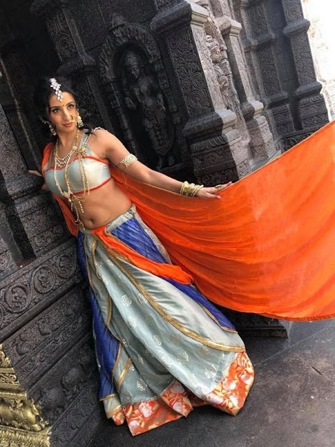 Sanjjanaa Galrani posing in a glamorous outfit