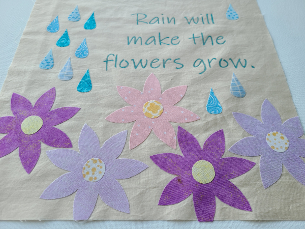 Rain will make the flowers grow quilt block | DevotedQuilter.com