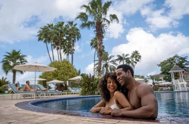 A couple enjoying on a swimming pool in moon palace jamaica