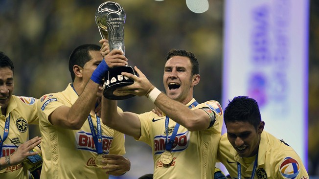 América, Campeón del Torneo Apertura 2014 del futbol mexicano Liga MX. Derrotó 3-0 (3-1 global) a Tigres, quien terminó con 8 jugadores por expulsión. América consigue su estrella número 12, convirtiéndose así en el máximo ganador del futbol mexicano | Ximinia