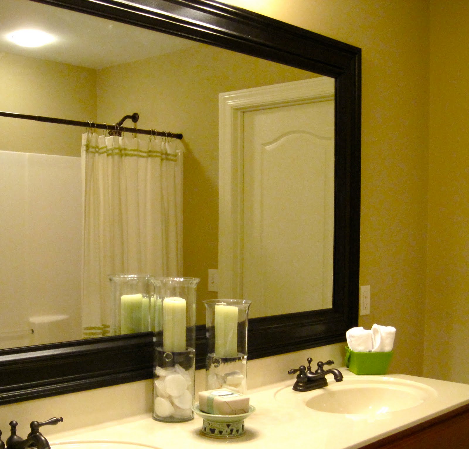 remodelaholic | bathroom mirror frame tutorial