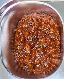 Red pepper paste fried with beef, sesame oil, honey, and pine nuts