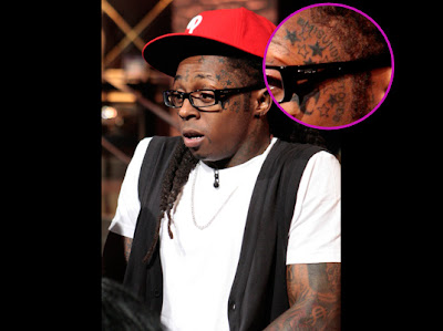 lil wayne tattoos on face