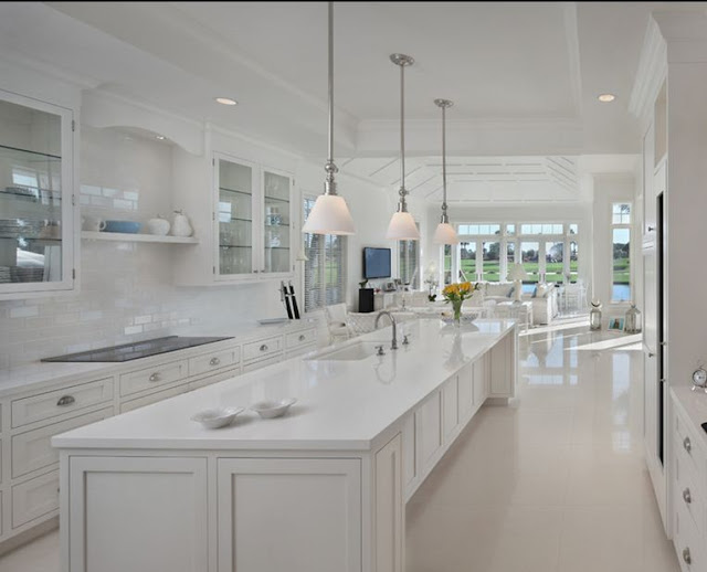 all white kitchen white floors
