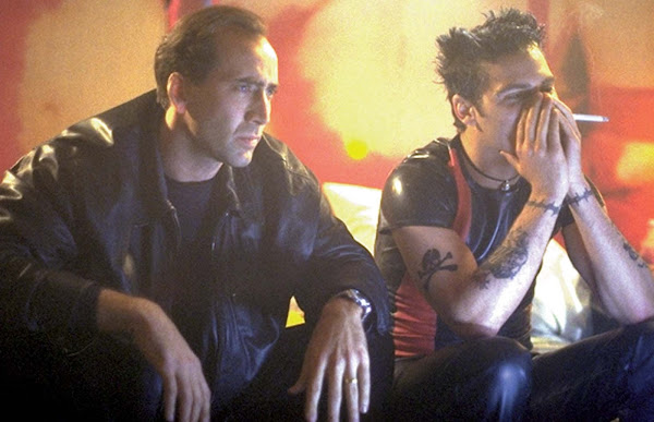 8mm nic cage and joaquin phoenix