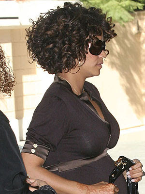 Halle Berry's, short curly wedge shaped hairstyle, 
