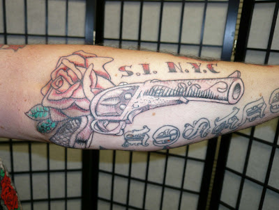 Pistol tattoo Staten Island New York City Kick ass tattoos are being done