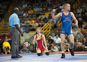 Sam Hazewinkel celebrates his win while Nick Simmons pleads his case to the .