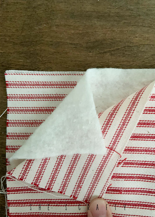 Cut striped fabric and batting to 5.5 inches for Flag.