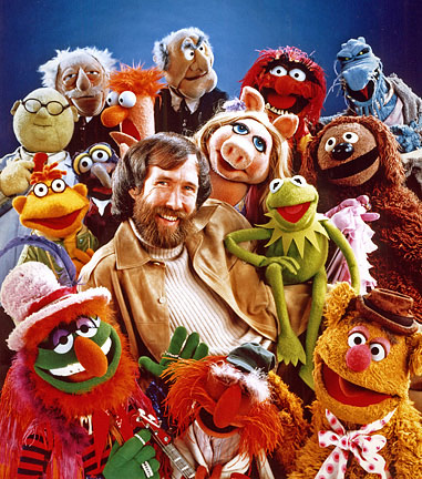 Jim Henson surrounded by over a dozen of the best-known Muppets