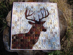 Reverse applique deer quilt