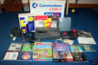 Commodore Amiga CD32 with SX-1 and games