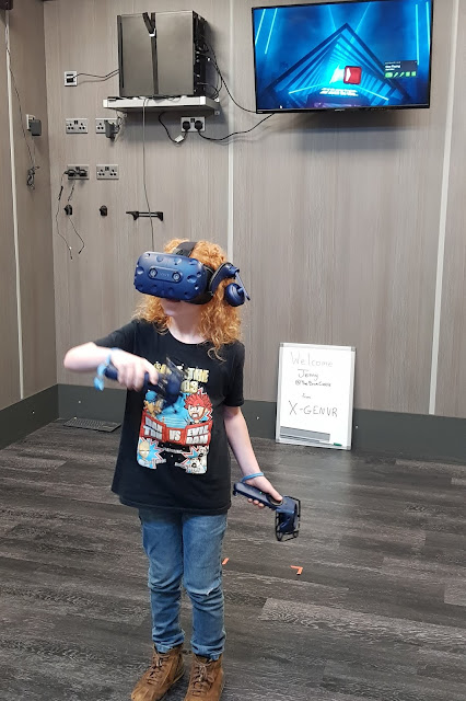 My youngest son playing Beat Saber VR game at X-Gen VR Stockport