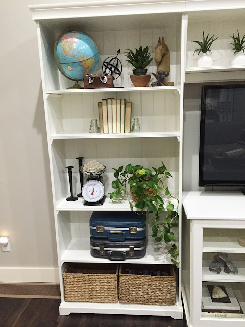 How to style a bookshelf by www.jengallacher.com. Liatorp Bookshelf and Entertainemtn Center from Ikea. #shelfie #bookshelves #stylingashelf