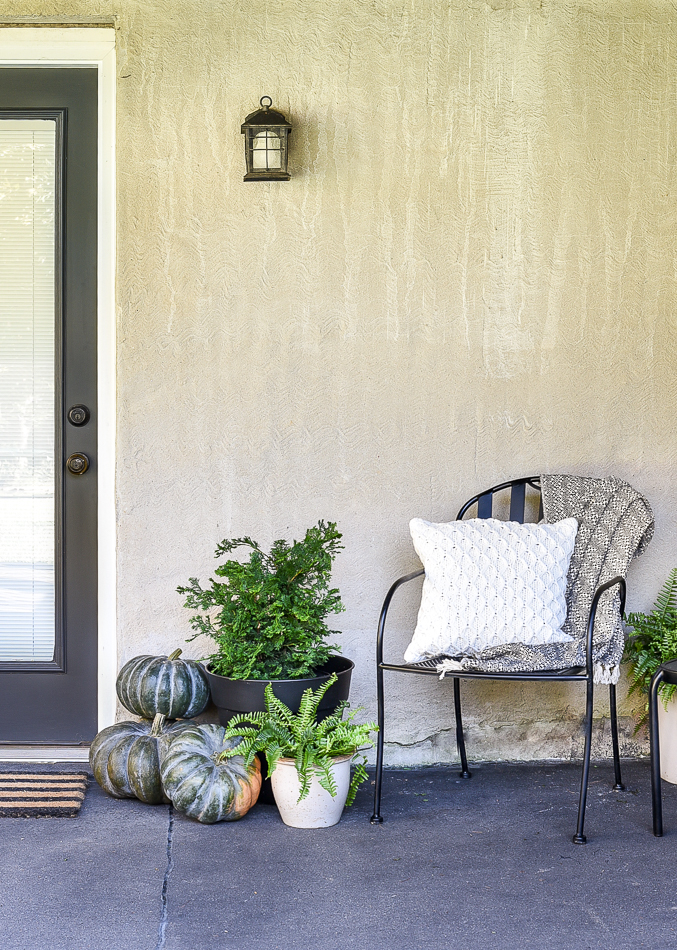 Fall patio decor with pumpkins