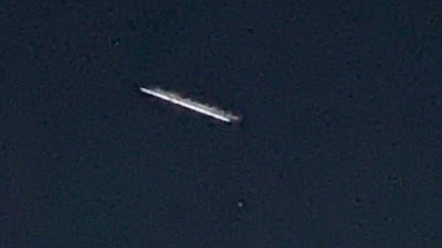 This is a great white Cylinder Shape UFO sighting photographed over the USA 2020.