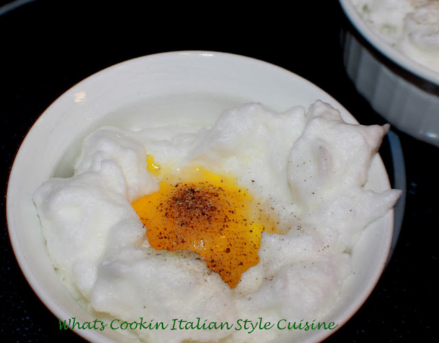 Baked fluffy eggs with a perfectly cooked egg in the middle. A healthy baked egg buttery flavor and light breakfast in a souffle style ramekin