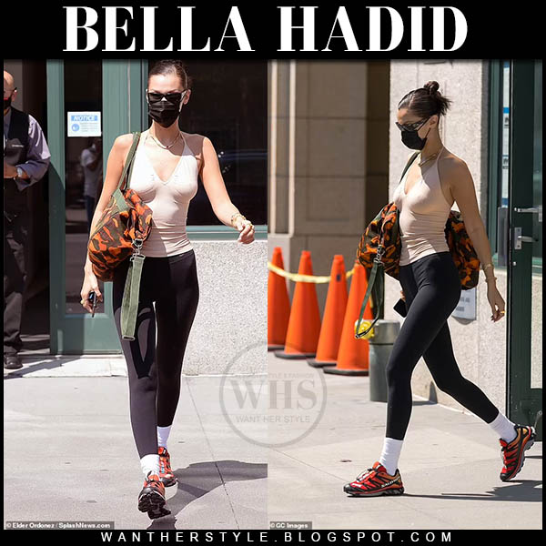 Bella Hadid in red Salomon sneakers