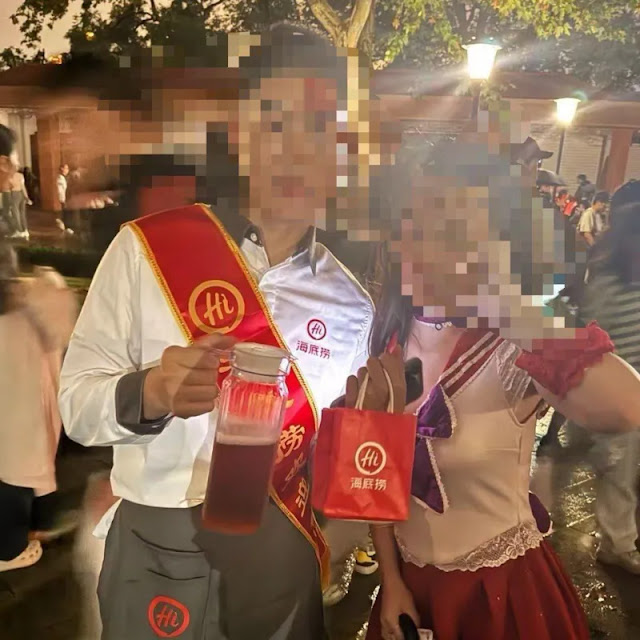 One reveller dressed up as a waiter from popular hotpot chain Haidilao