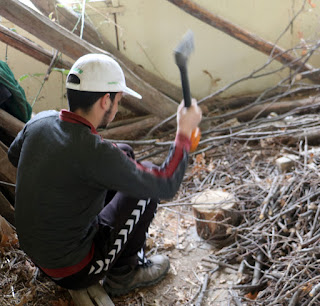 Ennis chopping up wood