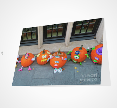 This image is a screen-shot of my Halloween-themed notecards which is titled “The Pumpkin Choir.” The picture was taken on the Eastside of NYC in front of a brownstone which was decorated for when for Halloween. It shows an array of pumpkins that have faces painting on them they could be carolers if the season had been Christmas. A copy of this image is featured in volume two of my book series, "Words In Our Beak." Info re this series can be found on my blog @ https://www.thelastleafgardener.com/2018/10/one-sheet-book-series-info.html AND info re this particular note-card is can be found on Fine Art America @ https://fineartamerica.com/featured/the-pumpkin-choir-patricia-youngquist.html?product=greeting-card