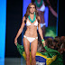 No rivalry! Miss Universe Argentina with the Brazilian flag