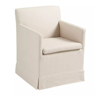 upholstered rolling dining chair in light fabric