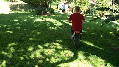 A picture of me riding around on a little dirt bike.