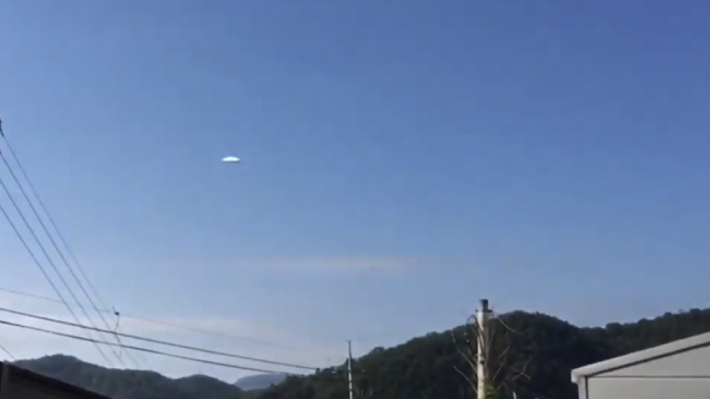 Large Tic Tac shaped UFO which was filmed over the eye Witnesses house.