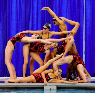 A group of synchronized swimmers in formation