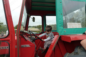 Child sitting in a tractor