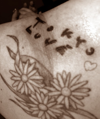 flower tattoos on side of hand. Flower Tattoos Back Lady Gaga