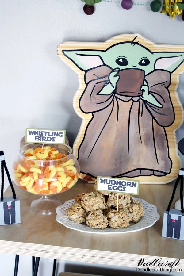 Name the food at your Baby Yoda party things to do with the Mandalorian series. Mudhorn eggs are actually Special K treats, and whistling birds are just gummy rings, but it's all about the presentation.