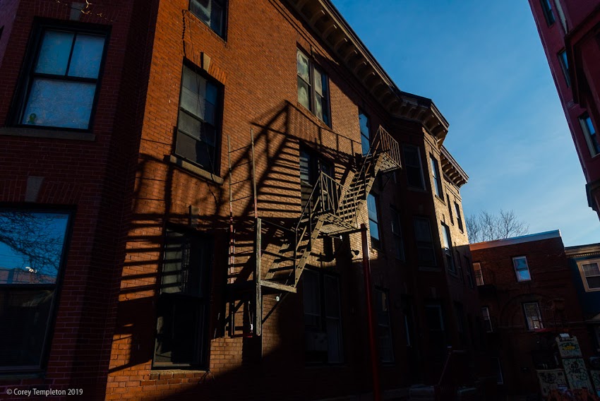 Portland, Maine USA December 2019 photo by Corey Templeton. Some well-defined fire escape shadows on Danforth Street.