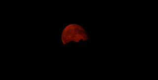 Moon rising over the ridge