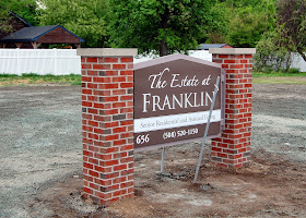 the sign for the Estate at Franklin during their construction period