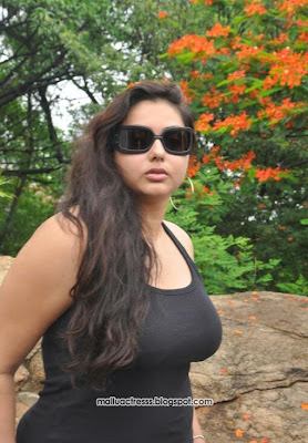 Namitha hot in in tight dress stills