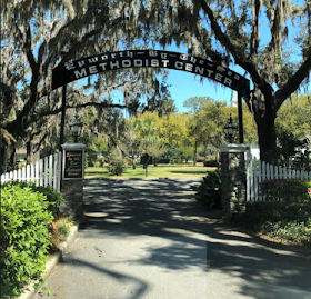 The entrance way of Epworth by the Sea with a sign that reads, “Epworth by the Sea METHODIST CENTER.”   