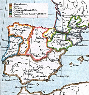 A map of the Iberian peninsula in 1210 CE. The bottom half is largely taken up by Muslim territory, which extends across the Strait of Gibraltar into Africa. The northern half of what is now Portugal has become the earliest beginnings of that nation. Around it on the north and east is León. The east of León is Castille. East of Castille is Aragón, with the smaller kingdom of Navarre squished between them in their northern halves. To the east of Aragón is an area containing Barcelona and portions of southern France which is somewhat confusingly labelled on this map.