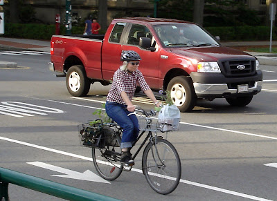 pickup truck bicycle hauling goods