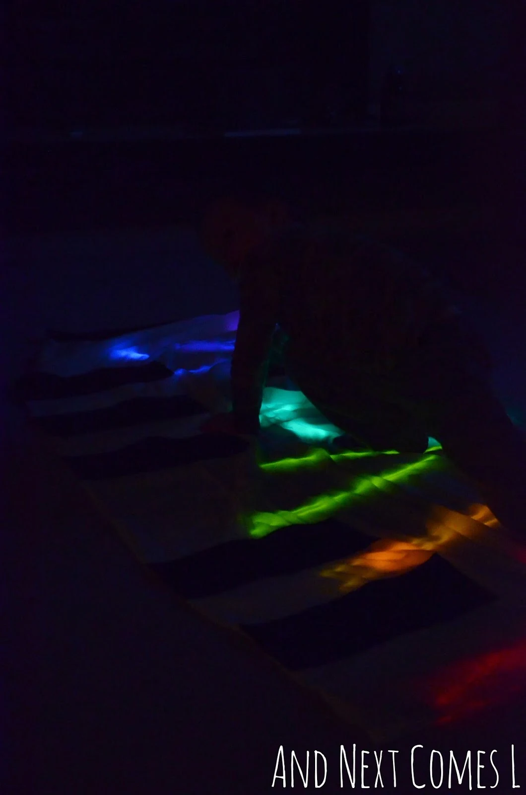 Playing twister on a homemade glowing floor piano from And Next Comes L