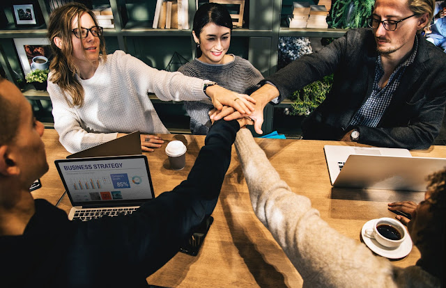 Employees during a small business meeting