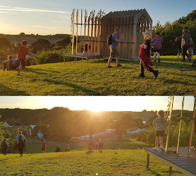 Timber Festival 2019 review sunset over the site from the top of a big hill 