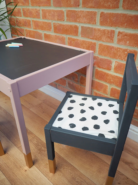 DIY IKEA hack turning the LATT childrens table and chairs upcycled into a chalkboard drawing station using chalkboard paint, dalmatian fabric to create seat pads and gold dipped legs. Perfect for nursery or playroom decor and a budget way to create a stylish table and chairs for your children. DIY home interior decor.