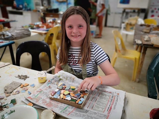 girl making a mosaic