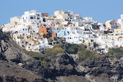 . has arranged a driver to meet us at the dock in Santorini . (img )