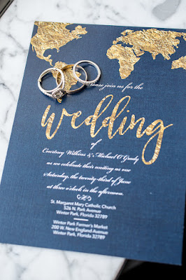 navy and gold world map wedding invitations