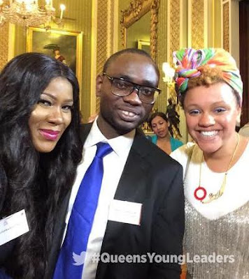 The Linus Idahosa with friend at Buckingham Palace