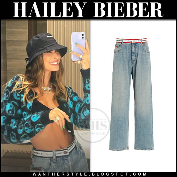 Hailey Bieber in black Yin Yang cardigan and jeans